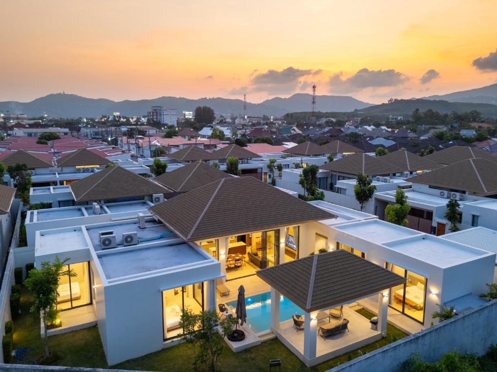 Aerial sunset view of the Enimsay retreat villa, Phuket Thailand